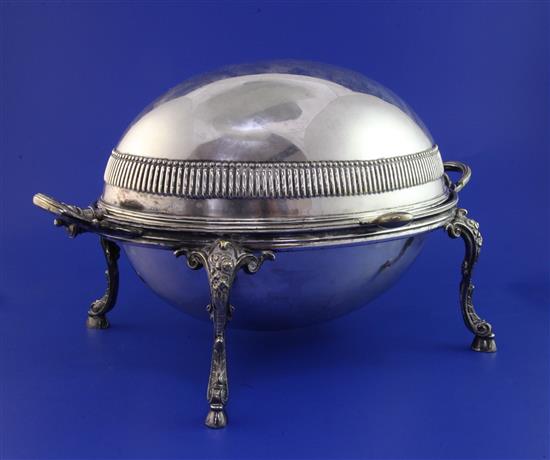 A Victorian silver plated revolving two handled breakfast tureen, 14in over handles.